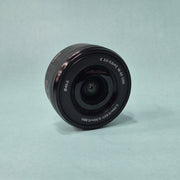 c) Sony A6100 Mirrorless Camera with Kit Lens – Excellent Condition