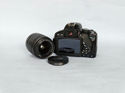 a) Canon EOS 650D DSLR Camera with 18-55mm f/3.5-5.6 IS Lens | 18MP APS-C Sensor | Full HD Video | Vari-Angle Touchscreen | Beginner Friendly Photography Camera 📸🔥