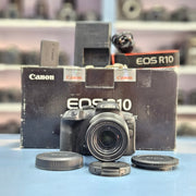 a) Canon EOS R10 Mirrorless Camera with RF-S 18-150mm IS STM Lens | 24.2MP APS-C | 4K Video | Fast Hybrid Autofocus | Compact All-Rounder | SK1046