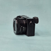 c) Sony A6100 Mirrorless Camera with Kit Lens – Excellent Condition