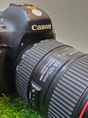 a) Canon EOS 6D Mark II DSLR Camera with 24-105mm Lens | 26.2MP Full-Frame Sensor | Dual Pixel Autofocus | Full HD Video | Versatile L-Series Zoom Kit | SK1055