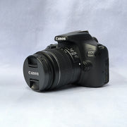 b) Canon EOS 1500D DSLR Camera with 18-55mm IS II Lens | 24.1MP | Full HD Video | WiFi | AB04