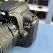 b) Canon EOS 3000D DSLR Camera with 18-55mm IS II Kit Lens | Beginner Friendly DSLR SK1028
