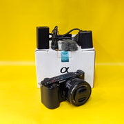 a) Sony ZV-E10 Mirrorless Camera with 16-50mm f/3.5-5.6 OSS Lens | 24.2MP APS-C | 4K Vlogging Camera