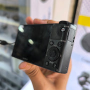 a) Sony DSC-RX100 Cyber-shot | Premium Compact Point & Shoot Camera | 20.2MP Cyber-shot Camera with Zeiss Lens | SK154