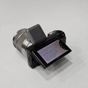 b) Sony NEX-5 with 18-55mm OSS Lens | Compact Mirrorless Camera Kit | SK503