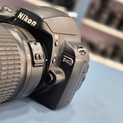 b) Nikon D40 DSLR Camera with 18-55mm Lens – SK266