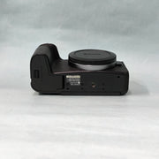 b) Canon EOS RP Full-Frame Mirrorless Camera Body | 26MP | 4K Video | Dual Pixel AF | Compact & Lightweight | SK1021