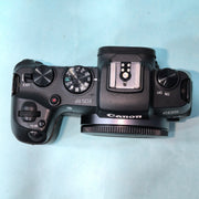 b) Canon EOS RP Full-Frame Mirrorless Camera Body | 26MP | 4K Video | Dual Pixel AF | Compact & Lightweight | SK1021