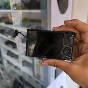 a) Sony DSC-RX100 Cyber-shot | Premium Compact Point & Shoot Camera | 20.2MP Cyber-shot Camera with Zeiss Lens | SK154