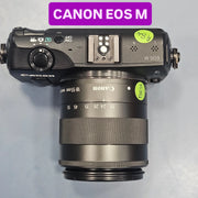 a) Canon EOS M Mirrorless Camera with 18-55mm Lens | Compact APS-C Camera (Code: AB36)