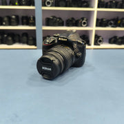 a) Nikon D3400 with 18-55mm VR Lens | 24.2MP Entry-Level DSLR Camera | Compact & Beginner Friendly | SK147