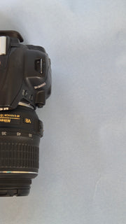 c) Nikon D3000 with 18-55mm Lens – 10.2MP DSLR Camera | Beginner Friendly | Sharp Image Quality