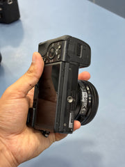 c) Sony alpha a6400 with 16-50mm lens full kit.
