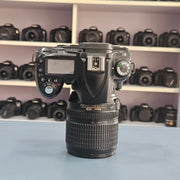 b) Nikon D90 DSLR Camera with 18-105mm VR Lens | 12.3MP | HD Video | Reliable Nikon DX Camera | SK252