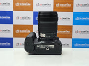 a) Canon EOS 70D DSLR Camera with 18-135mm IS Lens | 20.2MP APS-C Sensor | Dual Pixel Autofocus | Full HD Video | Versatile Zoom Kit | SK1053