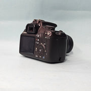 a) Canon EOS 1100D DSLR Camera with 18-55mm IS II Lens | 12.2MP APS-C | Beginner Friendly Camera | Lightweight DSLR | (Code AB01)