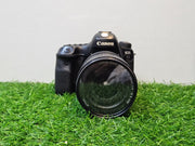 a) Canon EOS 6D Mark II DSLR Camera with 24-105mm Lens | 26.2MP Full-Frame Sensor | Dual Pixel Autofocus | Full HD Video | Versatile L-Series Zoom Kit | SK1055