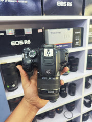b) Canon EOS 700D DSLR Camera with 18-55mm IS II Lens | Full HD Video | Touchscreen Display | SK1009