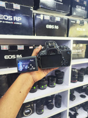 b) Canon EOS 700D DSLR Camera with 18-55mm IS II Lens | Full HD Video | Touchscreen Display | SK1009