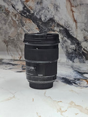 a) Sigma 50mm f/1.4 DG HSM Art Lens (Canon EF Mount) | Ultra-Sharp Prime | Beautiful Bokeh | Low-Light Performer | SK1050