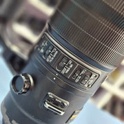 a) Nikon AF-S NIKKOR 600mm f/4E FL ED VR Lens | Super Telephoto Prime | Wildlife & Sports (Nikon F-Mount)
