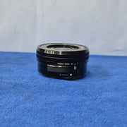 c) Sony Alpha A6000 + 16-50mm OSS Lens – Perfect for Photography & Video