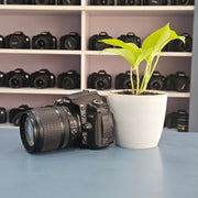 b) Nikon D90 DSLR Camera with 18-105mm VR Lens | 12.3MP | HD Video | Reliable Nikon DX Camera | SK252