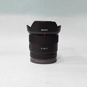 a) Sony E 11mm f/1.8 Ultra Wide-Angle Prime Lens | APS-C E-Mount | Fast f/1.8 Aperture | Lightweight Vlogging & Landscape Lens | SK1058