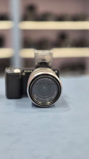 c) Sony NEX-5 with 18-55mm OSS Lens – Compact Mirrorless Camera