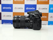 a) Canon EOS 70D DSLR Camera with 18-135mm IS Lens | 20.2MP APS-C Sensor | Dual Pixel Autofocus | Full HD Video | Versatile Zoom Kit | SK1053