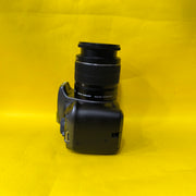 a) Canon EOS 1100D with 18-55mm f/3.5-5.6 IS II Lens | Beginner DSLR Camera for Photography & HD Video Shooting | SK196