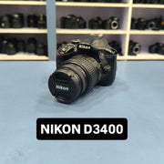 a) Nikon D3400 with 18-55mm VR Lens | 24.2MP Entry-Level DSLR Camera | Compact & Beginner Friendly | SK147