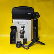 a) DJI Osmo Pocket 3 Creator Combo | 1-inch CMOS Sensor | 4K/120fps | 3-Axis Gimbal | Vlogging Camera Kit