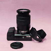 b) Sony A6400 Mirrorless Camera with 18-135mm f/3.5-5.6 OSS Lens | 24.2MP APS-C | 4K Video | Fast AF | SK522
