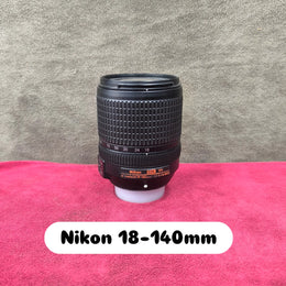 a) Nikon AF-S DX NIKKOR 18-140mm f/3.5-5.6G ED VR Lens | Versatile All-in-One Zoom Lens for Nikon DX DSLR Cameras | Travel, Portrait & Everyday Photography | SK169