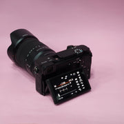 b) Sony A6400 Mirrorless Camera with 18-135mm f/3.5-5.6 OSS Lens | 24.2MP APS-C | 4K Video | Fast AF | SK522