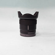 a) Sony E 11mm f/1.8 Ultra Wide-Angle Prime Lens | APS-C E-Mount | Fast f/1.8 Aperture | Lightweight Vlogging & Landscape Lens | SK1058
